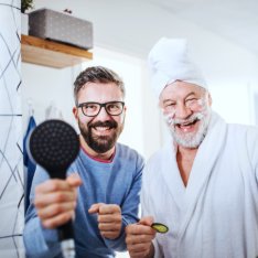 caregiver and his patient smiling
