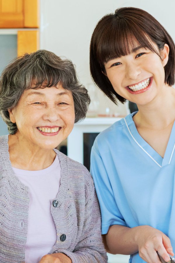 caregiver and patient smiling