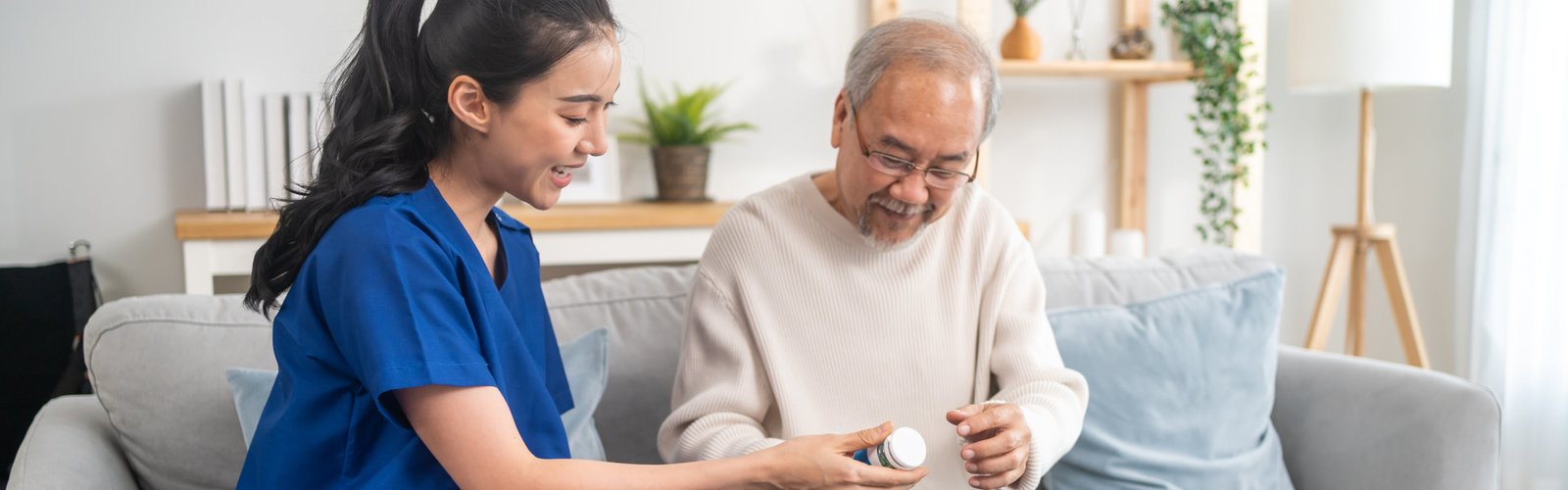 caregiver explain the medication to her patient